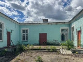 Имущественный комплекс в составе земельного участка общей площадью 11 618 кв.м. и 8 зданий и сооружений общей площадью 983,5 кв.м.